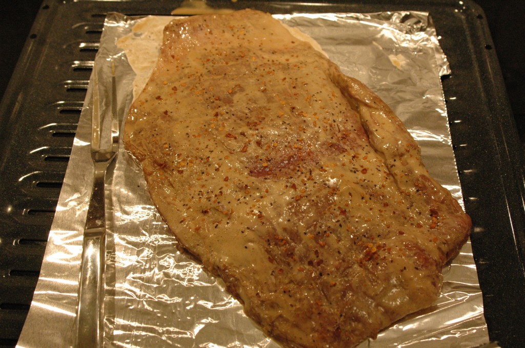 Big Raw Flank Steak--- dressed up and ready to broil!